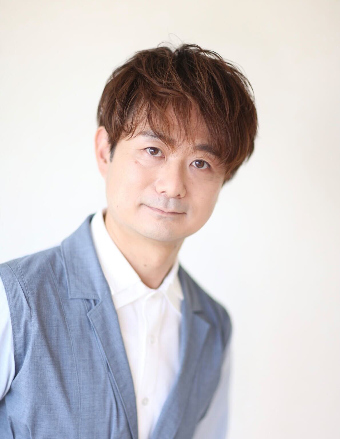 折出 賢一